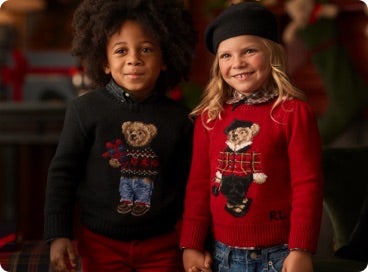 Kids wear sweaters with Polo Bears at front.