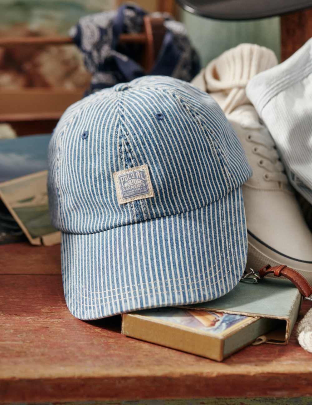Blue-and-white striped ball cap.