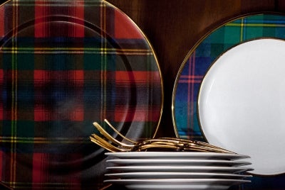 Plaid plates and silverware.